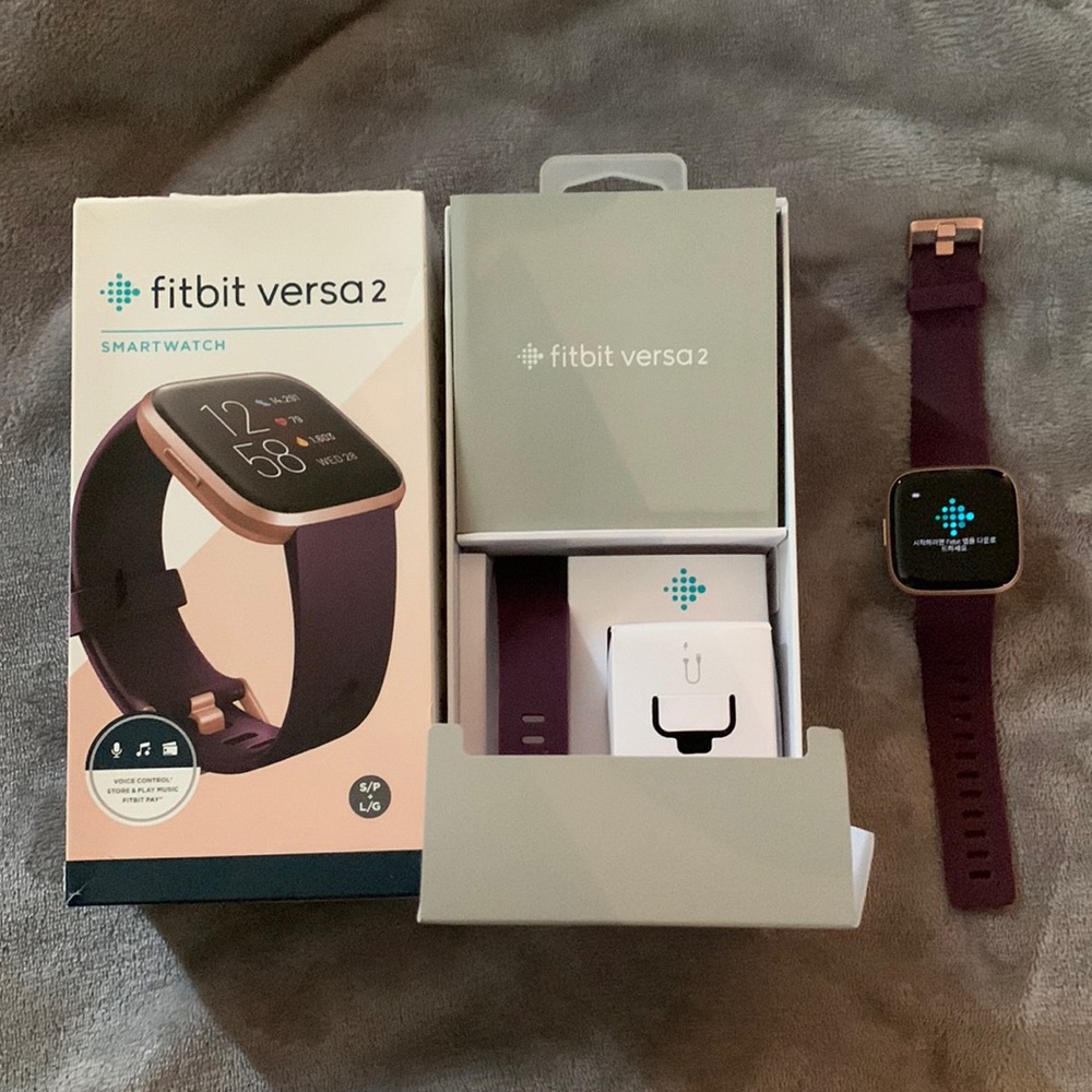 Gently Used - Fitbit Versa 2 with purple band